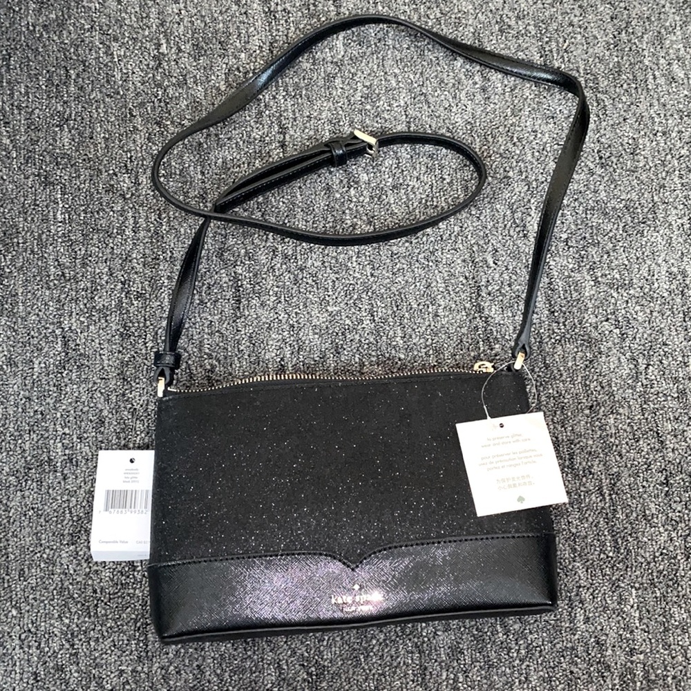 I’m selling a brand new, never use Kate Spade black purse
